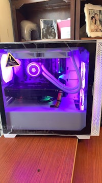 a computer case with a purple light on it